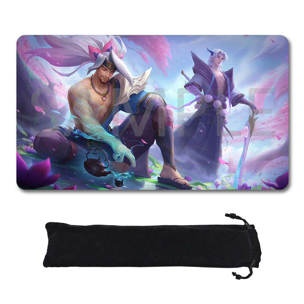 A rectangular gaming mouse pad with rounded corners featuring a colorful fantasy illustration of two characters in a pink and purple scene, shown above a black drawstring storage pouch on a white background.