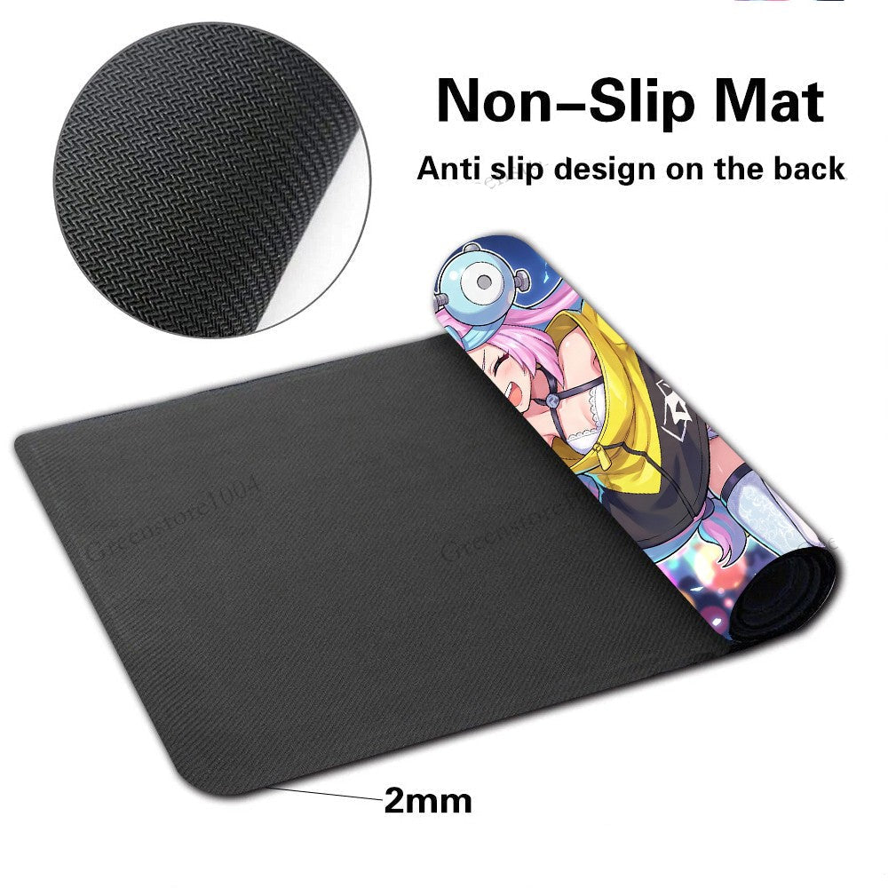 Black non-slip desk mat with a rolled section showing a colorful anime character print, plus a circular inset showing the textured black fabric backing. Text on the image reads 'Non-Slip Mat' and 'Anti slip design on the back', with a '2mm' thickness callout.