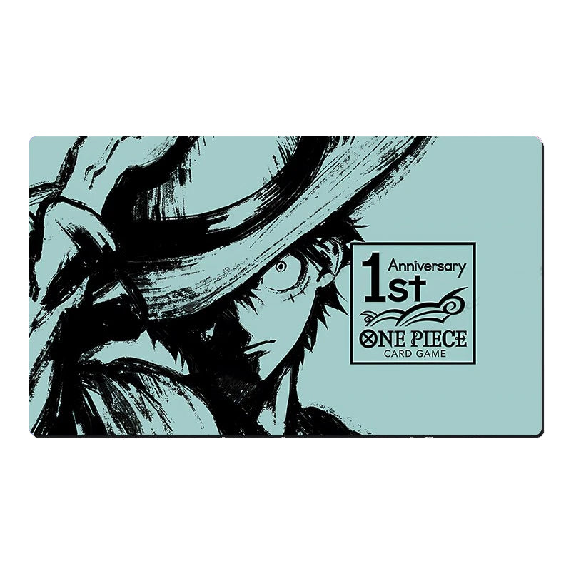 A One Piece 1st Anniversary card game playmat featuring a black ink illustration of Sanjiro on a light blue background, with the official logo in the bottom right corner.