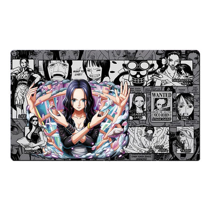 A rectangular anime playmat featuring a central illustration of a dark-haired female character surrounded by colorful energy effects, set against a collage background of black-and-white manga panels and character portraits. The playmat is shown flat against a plain white background.