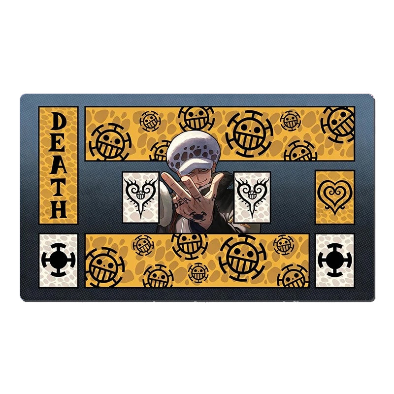 A rectangular anime-themed mat featuring One Piece character designs and the word 'DEATH' on a black background with yellow patterned sections.