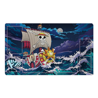 Playmat with a ship design on a blue wave background