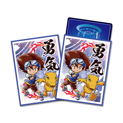 Two Pokémon-themed card sleeves or art cards shown on a plain white background, featuring a chibi boy with goggles, a yellow dinosaur-like Pokémon, and large Japanese characters. A blue backing card is partially visible behind them.