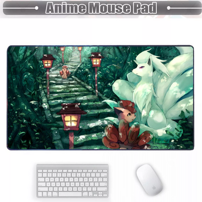 A large rectangular gaming mouse pad with anime artwork showing a white fox-like character, a small brown fox cub, and glowing lanterns on a stone path, displayed on a white background with a keyboard and mouse below and an 'Anime Mouse Pad' header banner above.