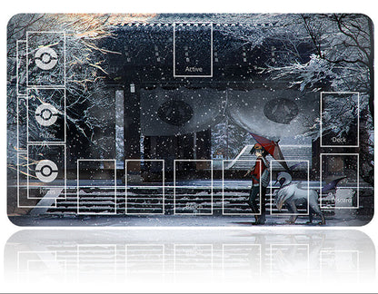 Card game mat with snowy scene and umbrella character, featuring a deck organizer.