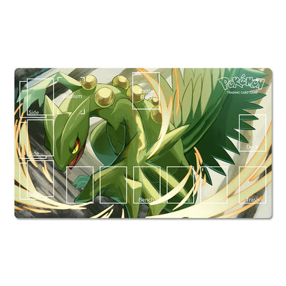 A rectangular Pokémon playmat featuring a detailed illustration of a green dragon-like creature with gold accents and a white Pokémon logo in the top right corner.