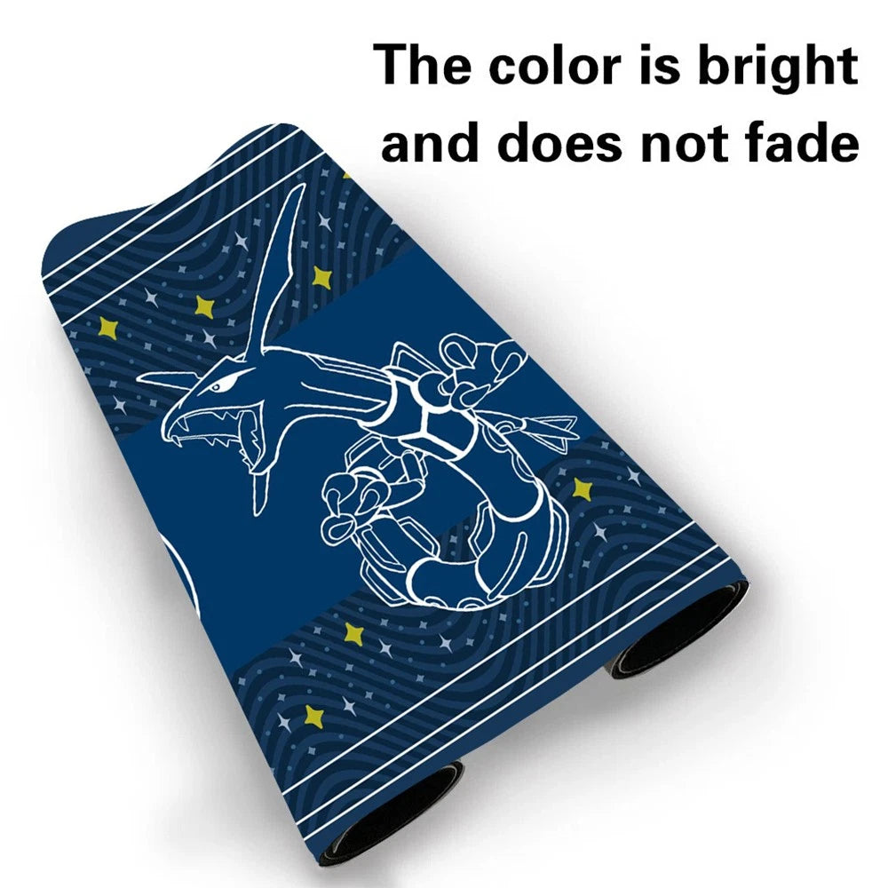 A rolled-up dark blue fabric item, likely a blanket or towel, featuring a white line-art illustration of a dragon and small yellow stars. Black text at the top reads, 'The color is bright and does not fade' on a white background.