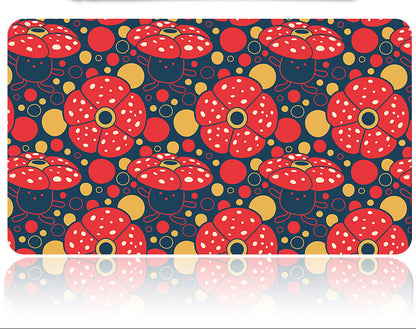 Colorful patterned wallet with red floral design on a white background