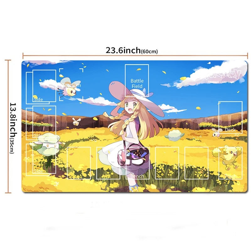 An anime-themed battle field mat with a colorful illustration of a girl in a field under a blue sky, shown with dimension markings of 23.6 inches by 13.