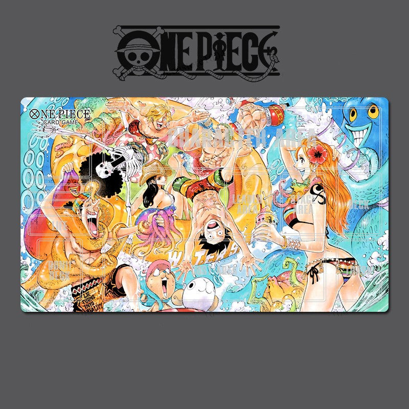 One Piece-themed playmat with characters and branding on a gray background