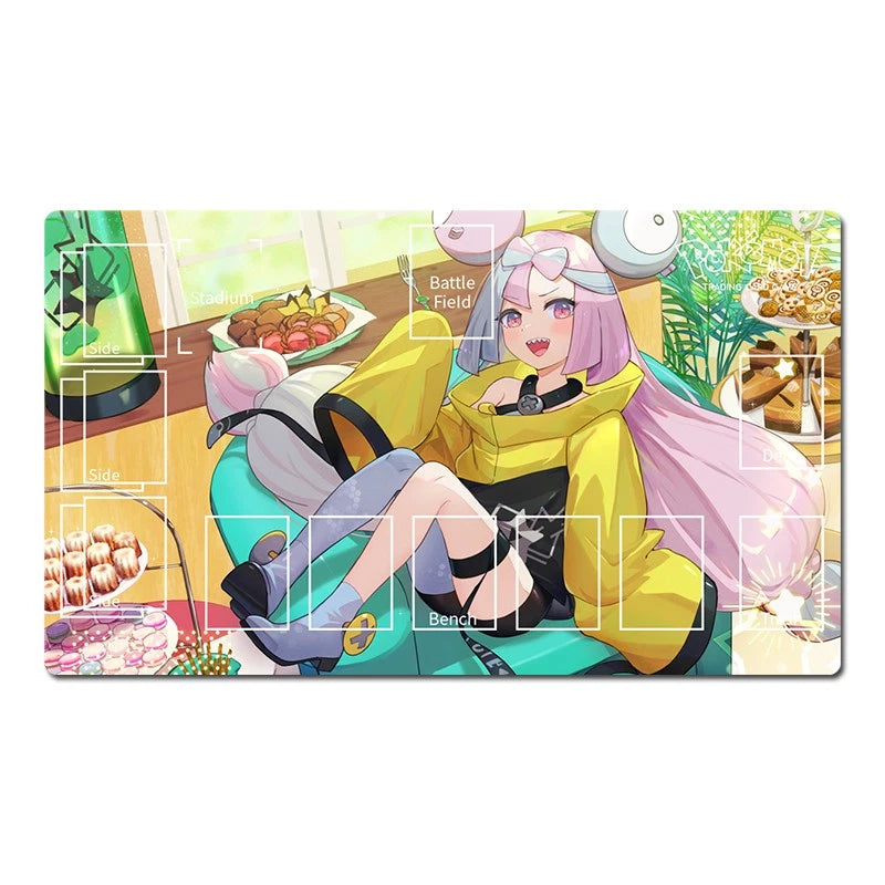 A rectangular illustrated desk mat or playmat featuring an anime-style character with pink hair lounging on a teal chair in a brightly lit room, surrounded by food and game-themed graphics. The mat is shown isolated on a white background.