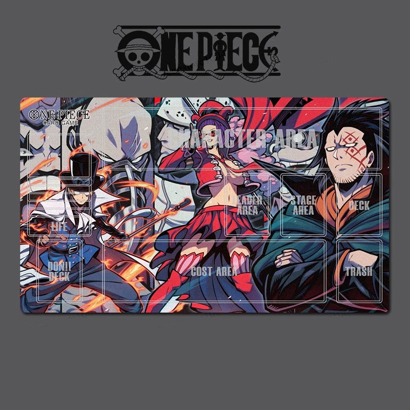 A One Piece themed playmat with anime character graphics, shown on a dark gray background with the One Piece logo above it.