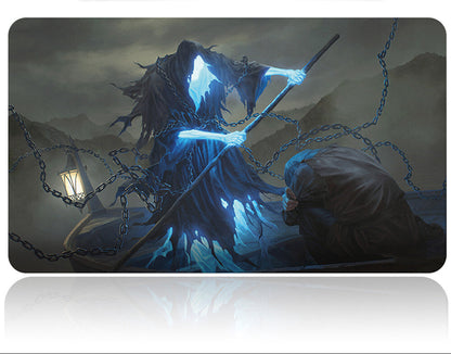 Gaming mouse pad with a dark fantasy design featuring a hooded figure and chains, with a flashlight above.