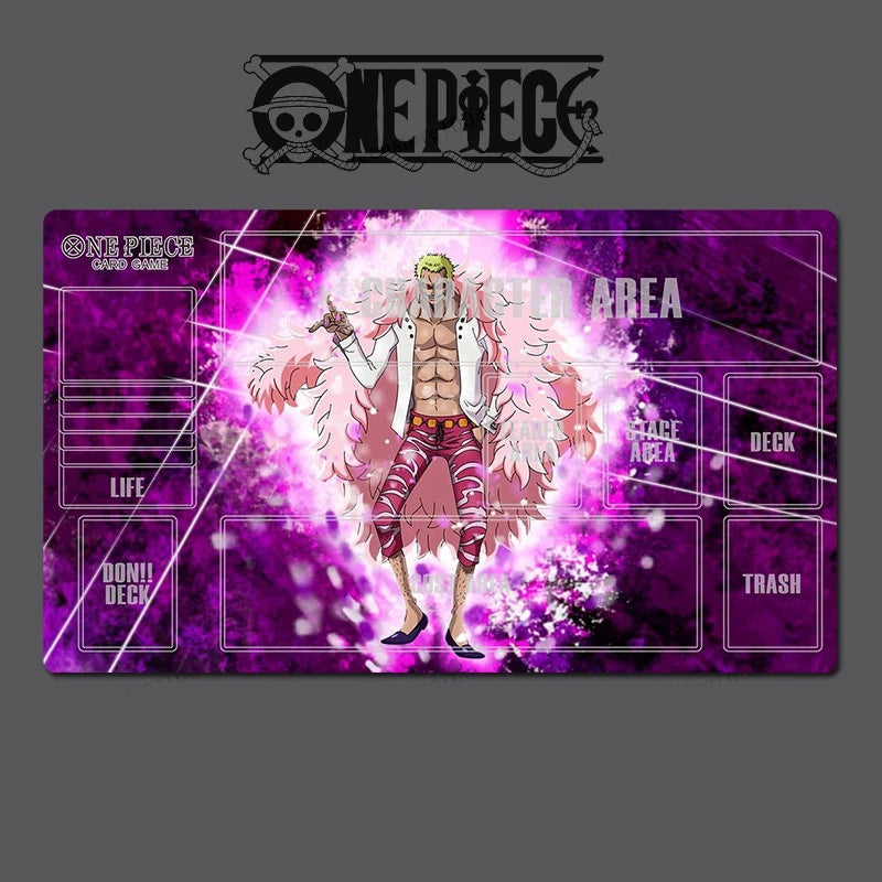 A One Piece trading card game mat featuring an anime character design on a purple and pink background, with labeled sections for life, deck, donut deck, trash, and game area. The One Piece logo is visible at the top.