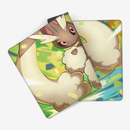 A square mousepad featuring a colorful illustration of a Pokémon character, shown at an angle on a light gray background.