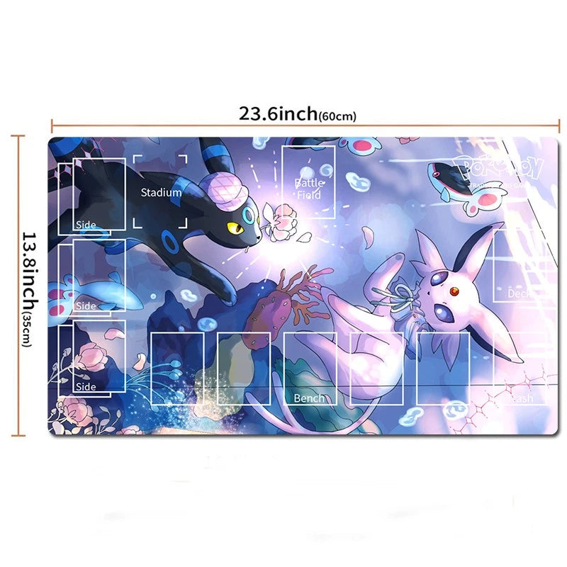 A rectangular gaming playmat with an anime-style illustration of two fantasy creatures in a blue and purple underwater scene, shown with dimension lines indicating 23.6 inches by 13.