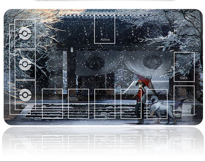 Card game mat with snowy scene and umbrella character, featuring a deck organizer.