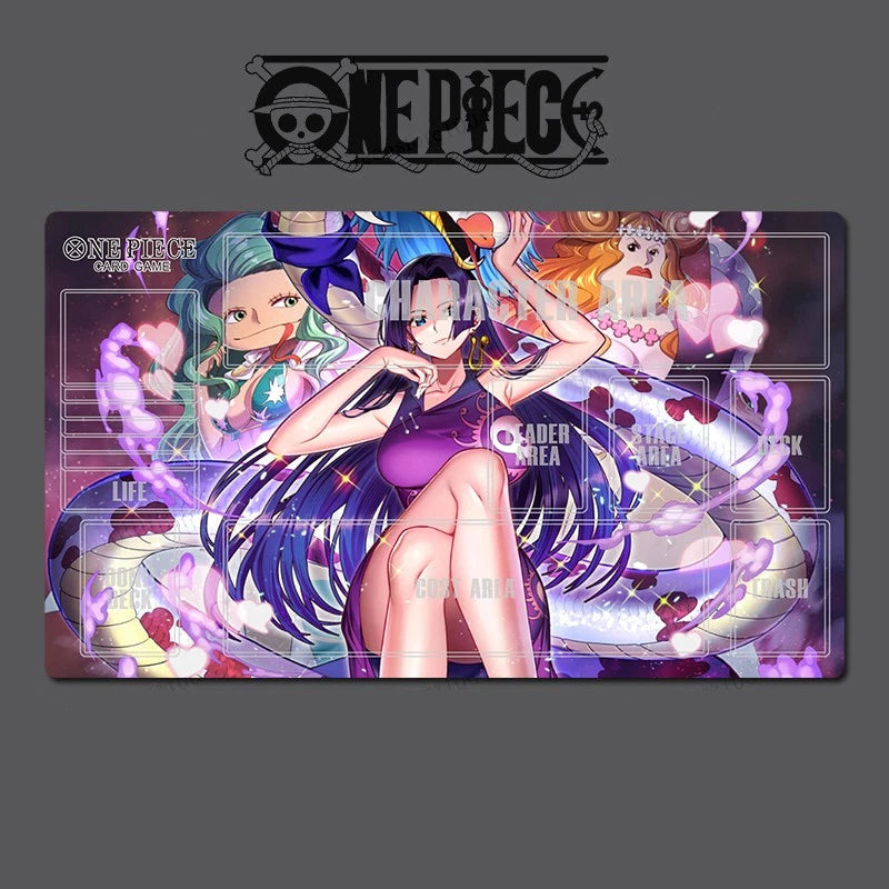 Playmat with anime characters and 'One Piece' branding on a dark background