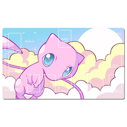 A rectangular desk mat or gaming playmat featuring a pastel illustration of Mew from Pokémon, with clouds and a blue sky background. White overlay text and grid lines suggest labeled gaming zones such as stadium, battle stance, deck, and base.