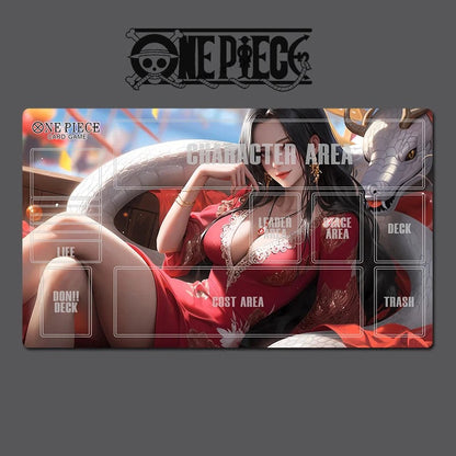 A One Piece themed gaming playmat featuring an anime illustration of a woman in a red dress and a white dragon, overlaid with a white card game deck layout including zones labeled Life, Don't Die, Leader, Space Area, Deck, Post Area, and Trash. The One Piece logo is visible at the top, and the playmat is shown on a dark gray background.