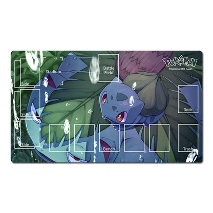A rectangular Pokémon trading card playmat featuring Bulbasaur on a leafy forest background, with printed game area labels such as Stadium, Battle Field, Bench, Deck, and Trash.