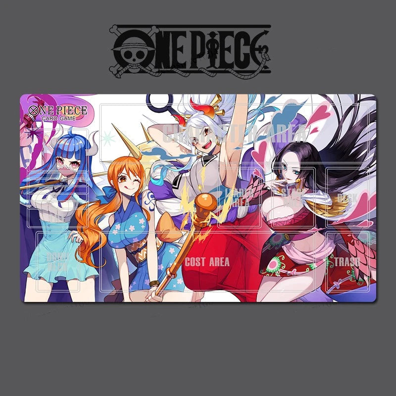 Playmat with 'One Piece' characters and branding on a dark background