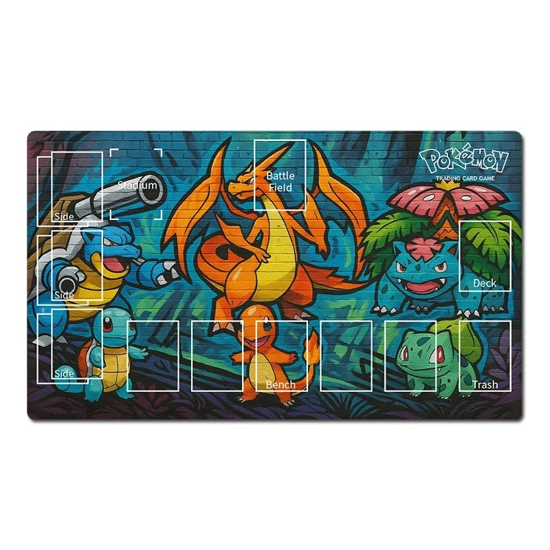 A rectangular Pokémon trading card game playmat featuring colorful illustrations of Charizard, Bulbasaur, Squirtle, and Mudkip on a dark blue background with white layout guides and labels for game zones.