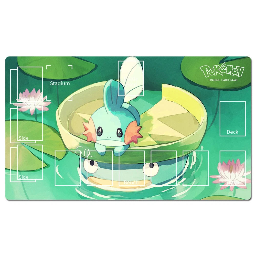 Pokémon Trading Card Game playmat featuring a cute light blue and pink frog character sitting on a lily pad in a green pond scene, with white layout guides for Stadium, Sides, Deck, and other zones.