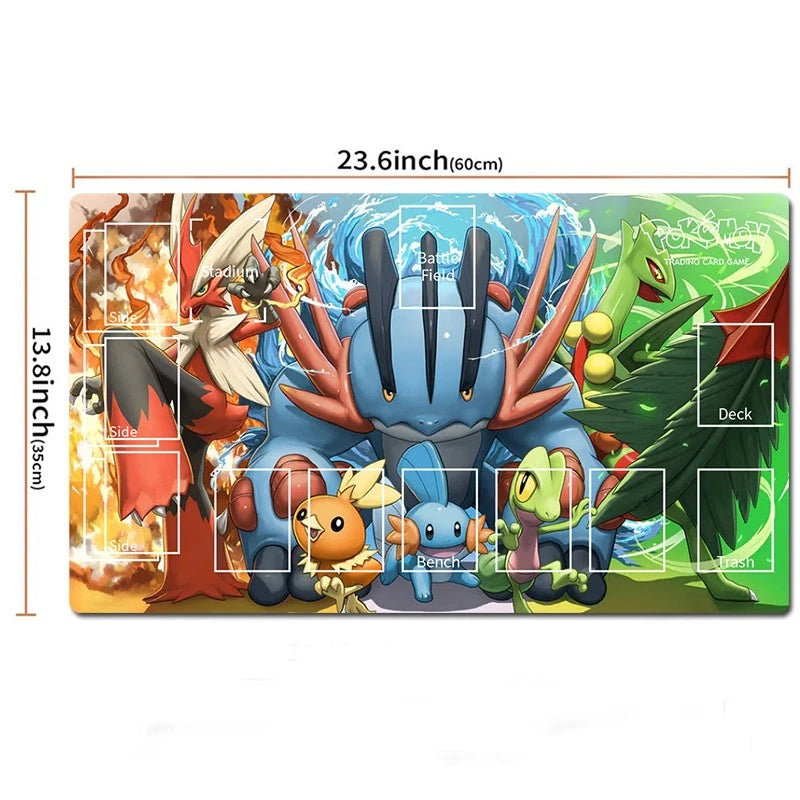 A rectangular Pokémon-themed playmat with illustrated characters including Charizard, Cyndaquil, Totodile, Chikorita, and a green dragon, shown on a white background with printed dimensions and deck/stash area labels.