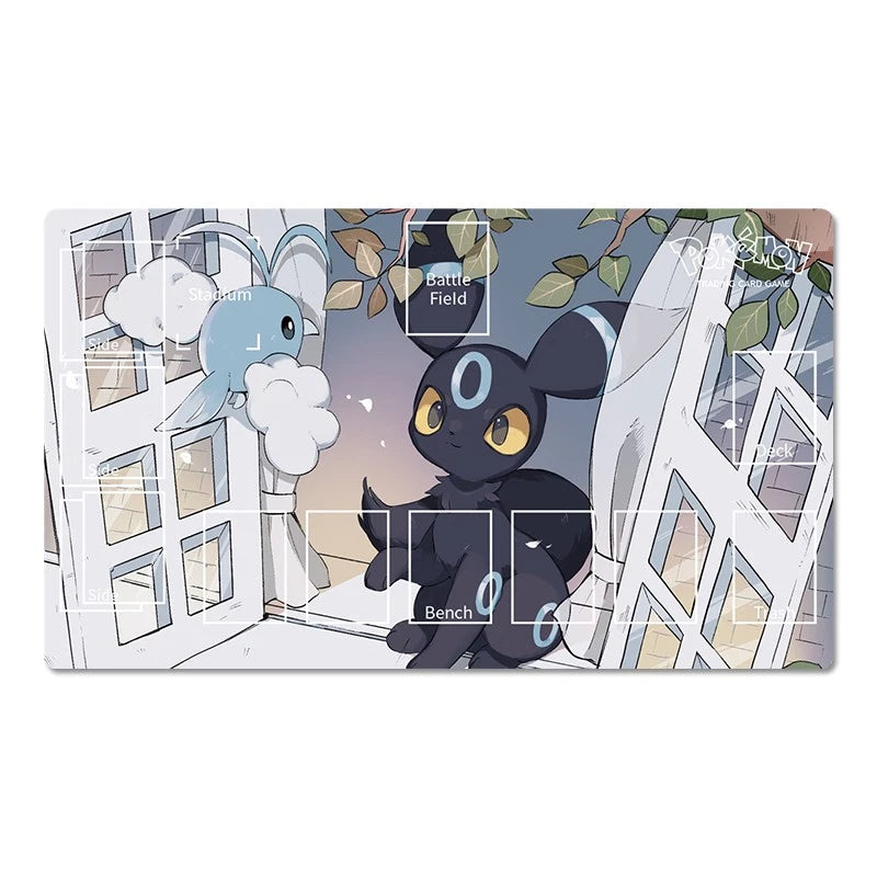 A rectangular gaming playmat featuring an anime illustration of a black cat-like character with yellow eyes and a blue crescent on its forehead, alongside a light blue creature with white clouds around it. The playmat is shown on a clean white background with subtle drop shadows.