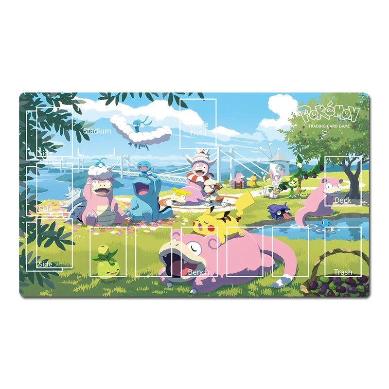 Pokémon Trading Card Game playmat featuring a colorful illustrated scene with various Pokémon characters in a grassy outdoor landscape, complete with a river, trees, and sky.
