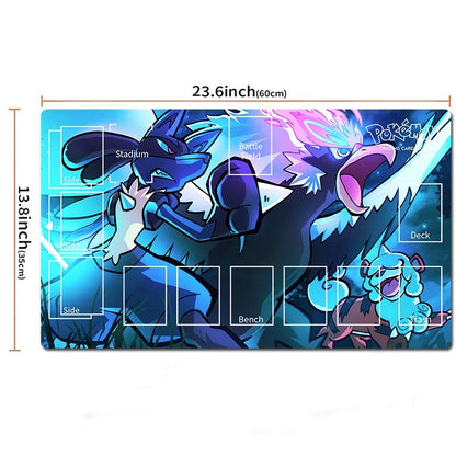 A Pokémon-themed gaming playmat with dimension markings showing 23.6 inches by 13.