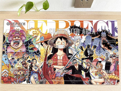 One Piece card game booster pack with various characters on a wooden surface.