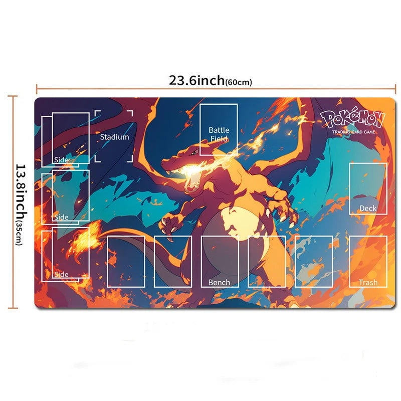 A rectangular Pokémon trading card playmat shown on a white background with dimension labels. The playmat features a colorful Charizard illustration with fiery orange and blue tones, and printed card-area guides labeled for sides, bench, deck, trash, and battle field.