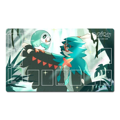 A rectangular Pokémon trading card playmat featuring a teal and black character design with white Pokémon branding in the top right. The mat includes printed play areas labeled Side, Bench, and Tash, plus decorative sparkles and dark tree-like graphics on a pale background.