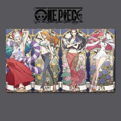A rectangular printed mat or desk pad featuring the One Piece anime characters Jami, Robin, and Zuzu in a stained-glass style, shown against a dark gray background with the One Piece logo above it.
