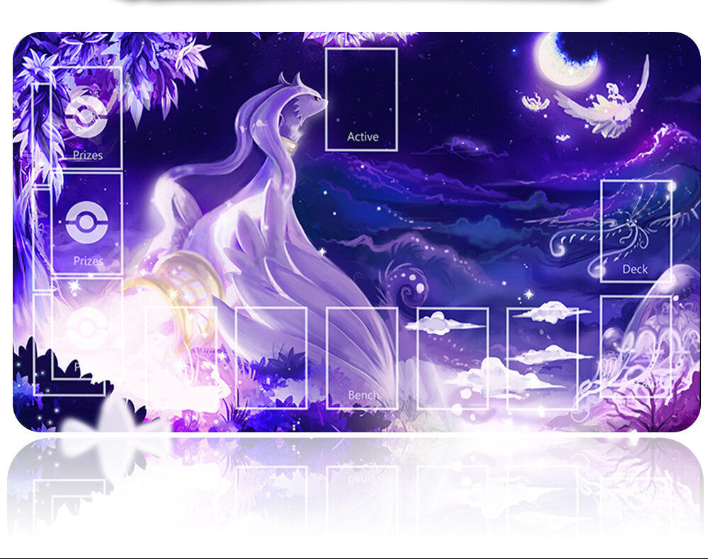 Card game mat with fantasy design featuring a white bird and moon, accompanied by a pen.