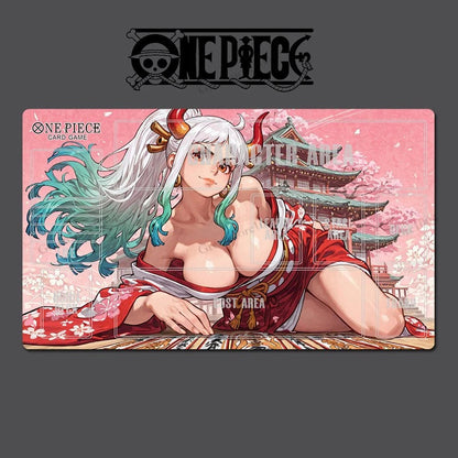 A One Piece card game playmat featuring an anime illustration of a character with white and teal hair, reclining in a red kimono against a pink background with cherry blossoms and a pagoda. The playmat is centered on a dark gray background with a One Piece logo at the top and faint watermark text across the image.