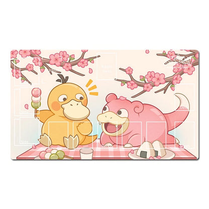 A rectangular printed mat or plaque featuring a pastel illustration of two Pokémon characters sitting at a picnic under pink cherry blossom branches. The left character is yellow and holds a pink-and-white ice cream cone, while the right character is pink and eating an onigiri.