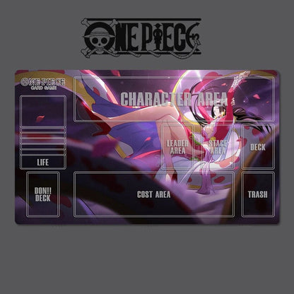 Card game mat with 'One Piece' branding and character design on a dark background